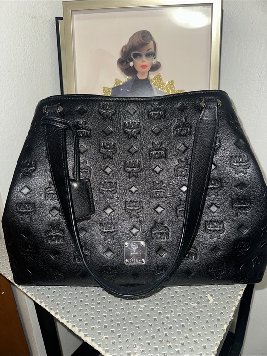 MCM Handbags - MCM Signature Monogrammed Black Leather Handbag